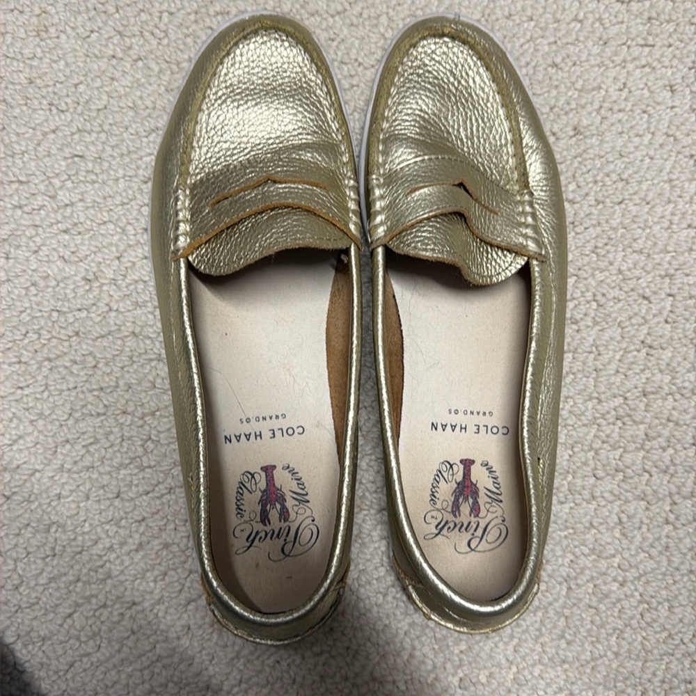 Metallic gold Cole Hassan boat shoes